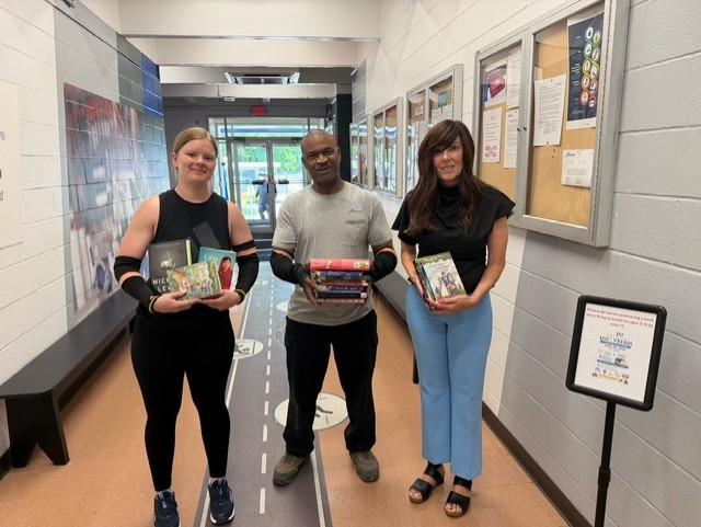 Unity4Kids team delivering books for Unity Reads